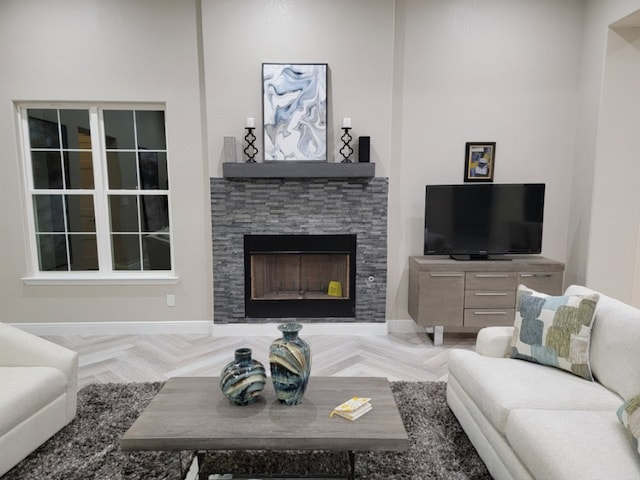 128 Gloria Blvd, Smithville, TX 78957 - living room with a stone fireplace and baseboards