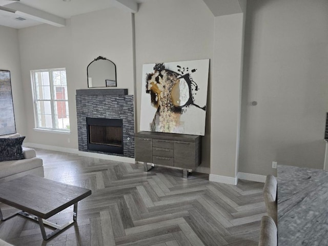 128 Gloria Blvd, Smithville, TX 78957 - living room featuring a stone fireplace, a high ceiling, and beam ceiling