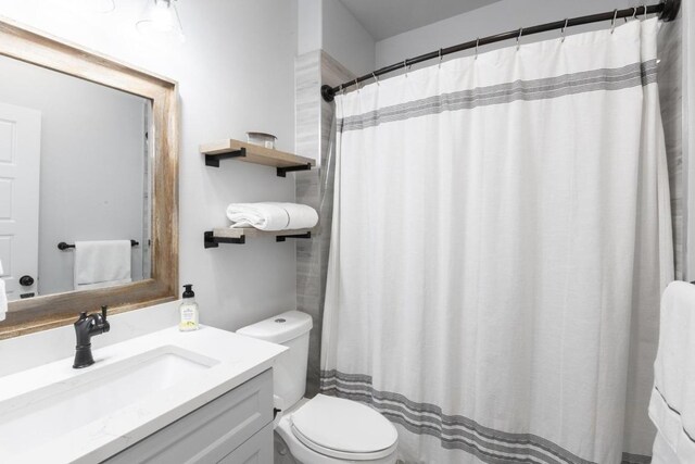116 Mallard Rd, Bastrop, TX 78602 - full bath with toilet, vanity, and a shower with curtain