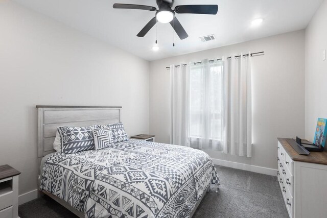 116 Mallard Rd, Bastrop, TX 78602 - carpeted bedroom with baseboards and ceiling fan