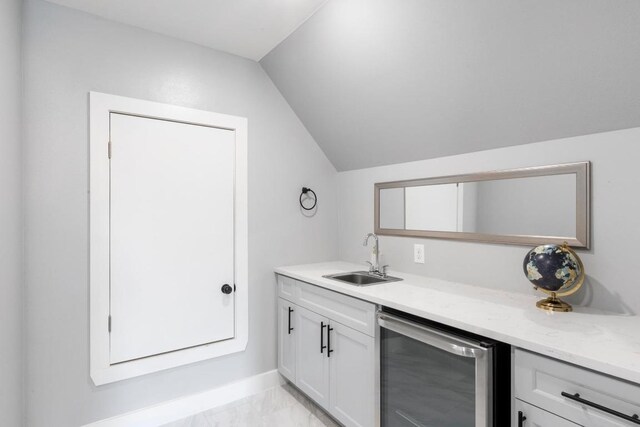 116 Mallard Rd, Bastrop, TX 78602 - indoor wet bar featuring beverage cooler, lofted ceiling, and light marble finish flooring