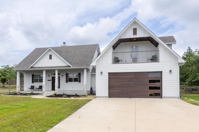 116 Mallard Rd, Bastrop, TX 78602 - modern inspired farmhouse featuring board and batten siding, roof with shingles, a porch, and a front lawn