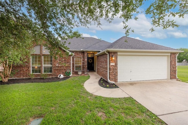 2627 Butterfly Dr, Temple, TX 76502 - view of front of house featuring driveway, roof with shingles, an attached garage, a front lawn, and brick siding
