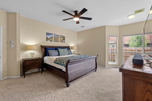 17704 Miller Falls Cv, Round Rock, TX 78681 - bedroom with light colored carpet and ceiling fan