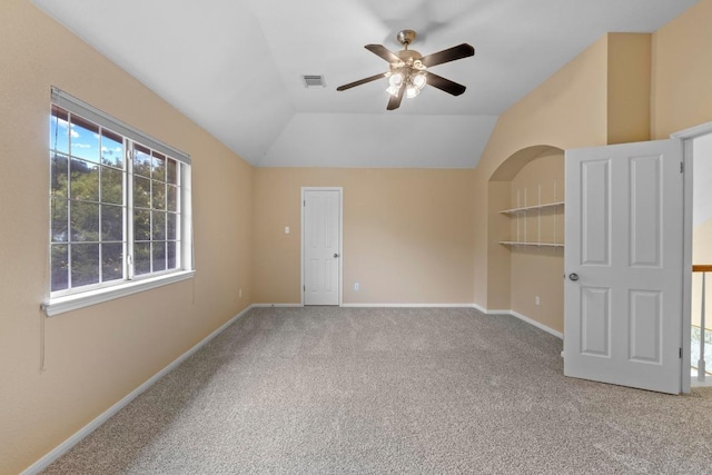 17704 Miller Falls Cv, Round Rock, TX 78681 - spare room with a ceiling fan, carpet flooring, and lofted ceiling