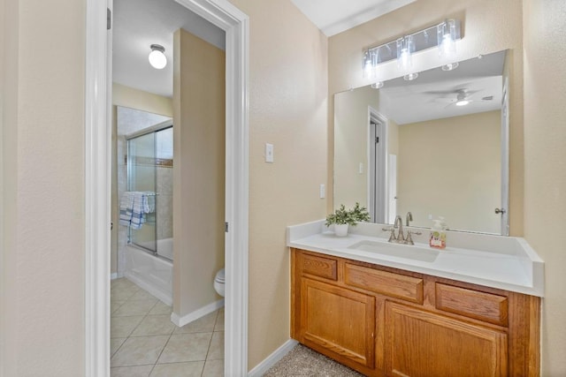 17704 Miller Falls Cv, Round Rock, TX 78681 - bathroom featuring vanity, tile patterned floors, shower / bath combination with glass door, and a ceiling fan