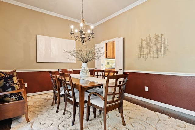 1613 Westend Pl, Round Rock, TX 78681 - dining space featuring hardwood / wood-style floors, ornamental molding, and a chandelier