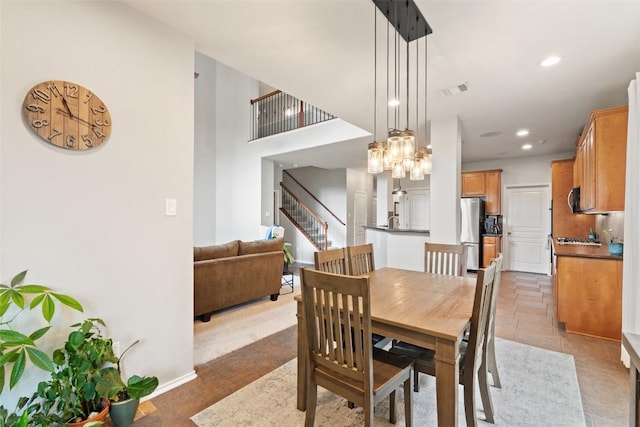 2705 Rosemount Cv, Round Rock, TX 78665 - dining room featuring stairway, recessed lighting, and baseboards