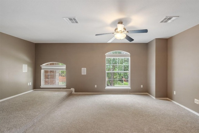 2705 Rosemount Cv, Round Rock, TX 78665 - carpeted spare room with a ceiling fan and baseboards