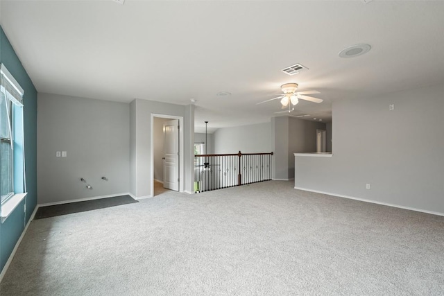 2705 Rosemount Cv, Round Rock, TX 78665 - spare room with carpet flooring, a ceiling fan, and baseboards