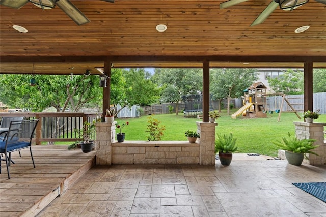 2705 Rosemount Cv, Round Rock, TX 78665 - view of patio featuring a trampoline, ceiling fan, a playground, and a deck