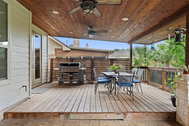 2705 Rosemount Cv, Round Rock, TX 78665 - wooden deck with outdoor dining space, ceiling fan, and grilling area
