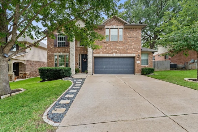 2705 Rosemount Cv, Round Rock, TX 78665 - traditional-style home featuring concrete driveway, a garage, and brick siding