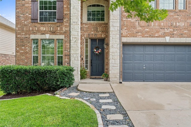 2705 Rosemount Cv, Round Rock, TX 78665 - property entrance featuring concrete driveway and brick siding