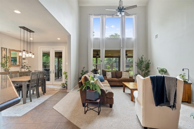 2705 Rosemount Cv, Round Rock, TX 78665 - tiled living area featuring plenty of natural light, ceiling fan, a towering ceiling, and recessed lighting