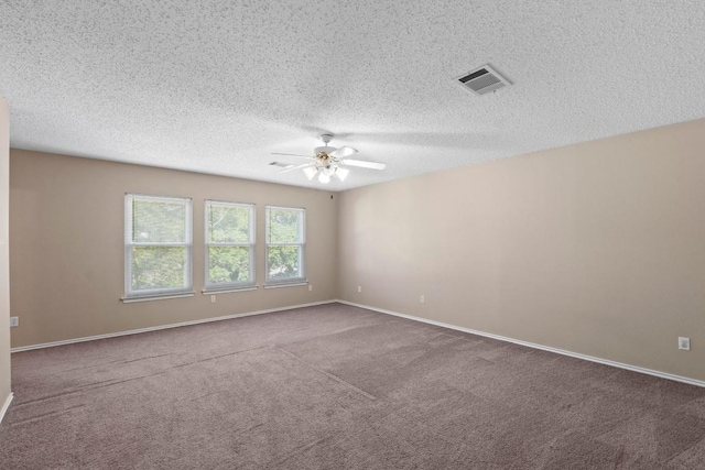 2507 Byfield Dr, Cedar Park, TX 78613 - spare room featuring a ceiling fan, carpet floors, baseboards, and a textured ceiling