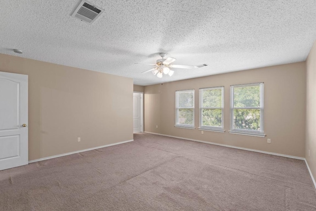 2507 Byfield Dr, Cedar Park, TX 78613 - spare room with a ceiling fan, carpet, and a textured ceiling