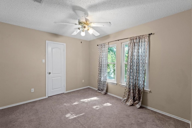 2507 Byfield Dr, Cedar Park, TX 78613 - carpeted spare room featuring a textured ceiling and ceiling fan