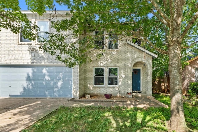 2507 Byfield Dr, Cedar Park, TX 78613 - view of front of home featuring driveway, an attached garage, and brick siding