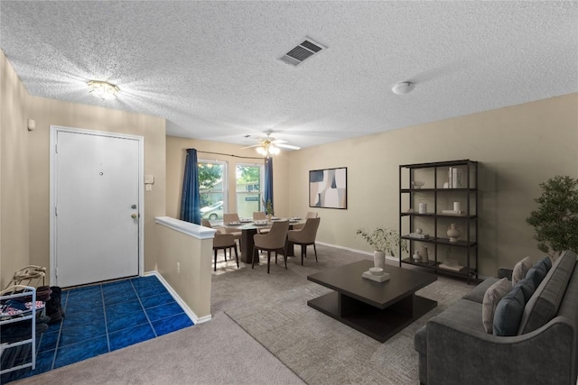 2507 Byfield Dr, Cedar Park, TX 78613 - living area featuring carpet flooring, ceiling fan, and a textured ceiling