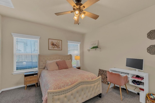 409 Red Matador Ln, Leander, TX 78641 - carpeted bedroom with baseboards and a ceiling fan