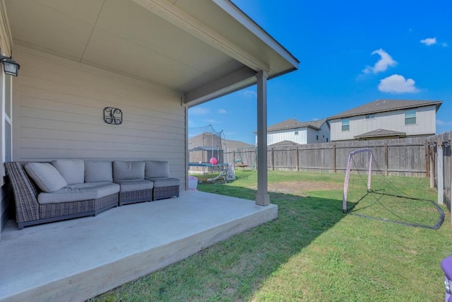 409 Red Matador Ln, Leander, TX 78641 - view of yard featuring a patio area, an outdoor living space, a trampoline, and a residential view