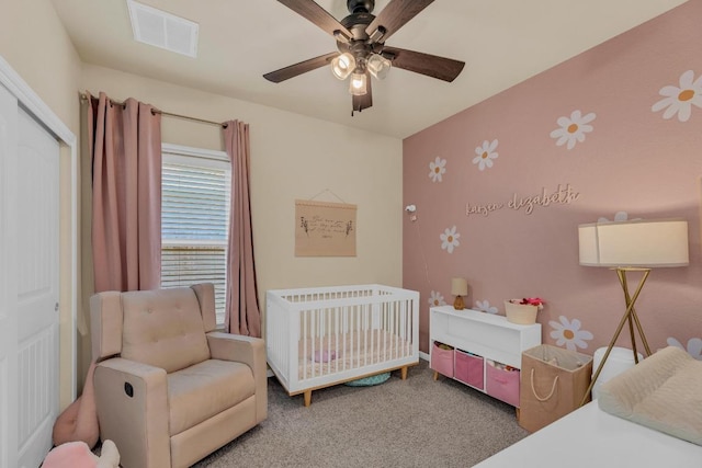 409 Red Matador Ln, Leander, TX 78641 - carpeted bedroom with a nursery area, a ceiling fan, radiator, and a closet