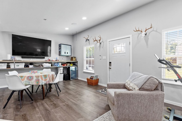 208 E Nakoma, Round Rock, TX 78664 - living room featuring healthy amount of natural light, dark wood-style flooring, baseboards, and recessed lighting