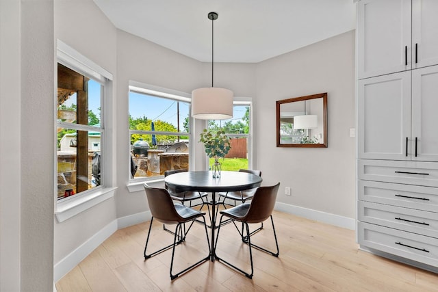 208 E Nakoma, Round Rock, TX 78664 - dining space with baseboards and light wood-style floors