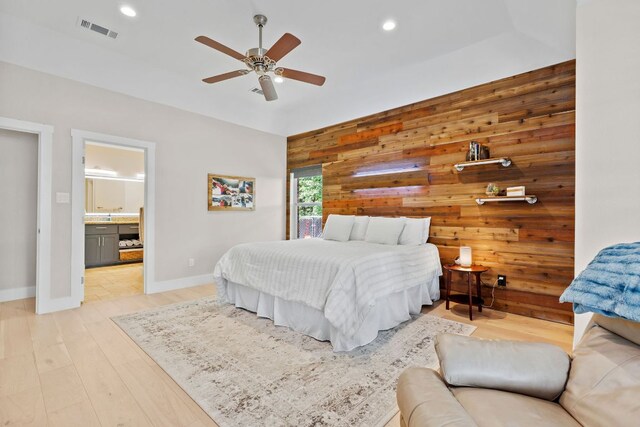 208 E Nakoma, Round Rock, TX 78664 - bedroom with wooden walls, light wood-style floors, recessed lighting, baseboards, and a ceiling fan