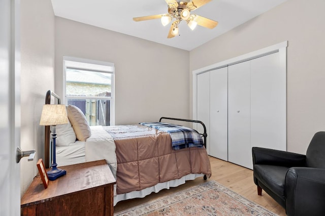 208 E Nakoma, Round Rock, TX 78664 - bedroom featuring light wood finished floors, a closet, and a ceiling fan