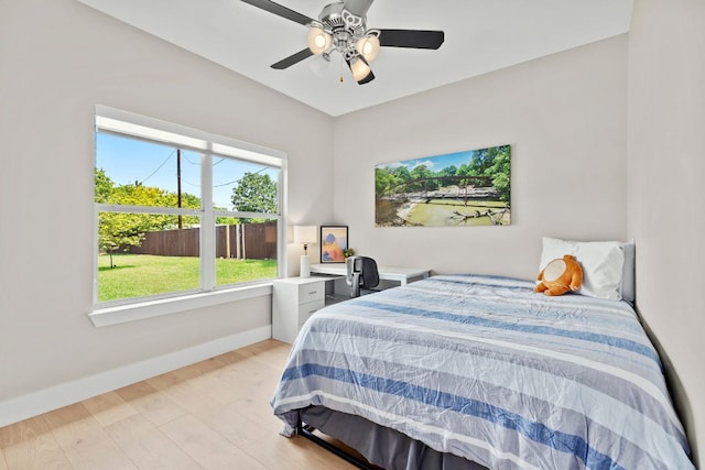 208 E Nakoma, Round Rock, TX 78664 - bedroom with baseboards, light wood-type flooring, and a ceiling fan