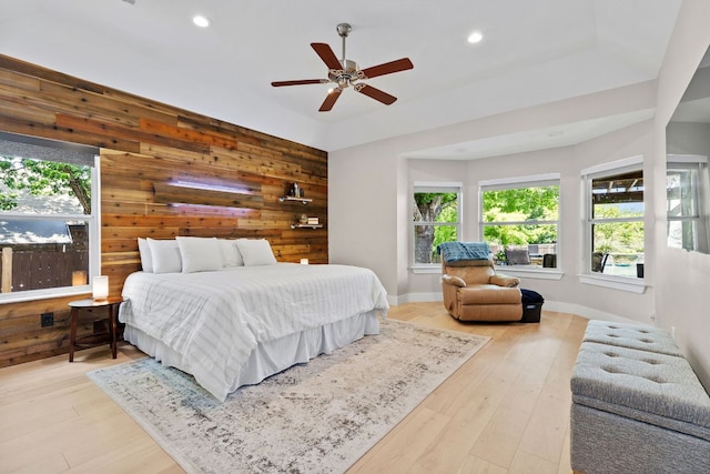 208 E Nakoma, Round Rock, TX 78664 - bedroom with wood walls, wood finished floors, recessed lighting, a raised ceiling, and ceiling fan
