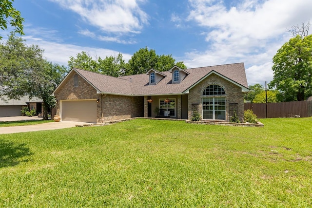 208 E Nakoma, Round Rock, TX 78664 - view of front of home featuring brick siding, a garage, driveway, and a shingled roof