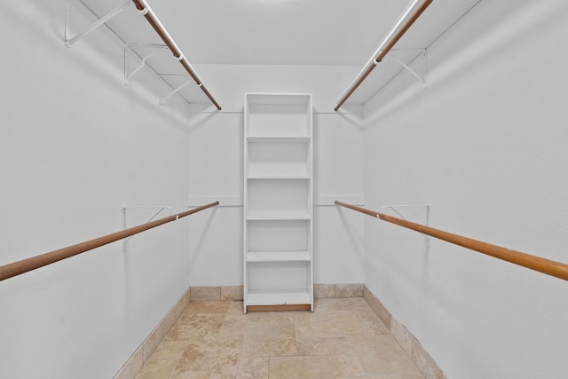 6706 Fort Davis Cv Unit B, Austin, TX 78731 - walk in closet with stone finish floors