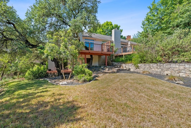 6706 Fort Davis Cv Unit B, Austin, TX 78731 - back of house featuring a deck, a yard, and a chimney