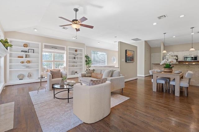 6706 Fort Davis Cv Unit B, Austin, TX 78731 - living area with a ceiling fan, dark wood-style flooring, built in features, recessed lighting, and vaulted ceiling