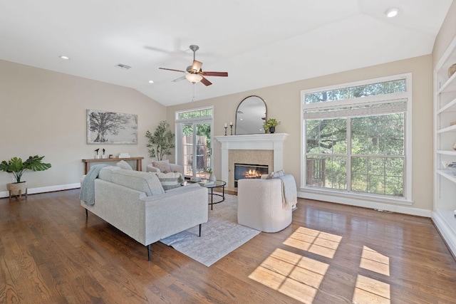 6706 Fort Davis Cv Unit B, Austin, TX 78731 - living area featuring vaulted ceiling, a ceiling fan, wood finished floors, a fireplace, and recessed lighting