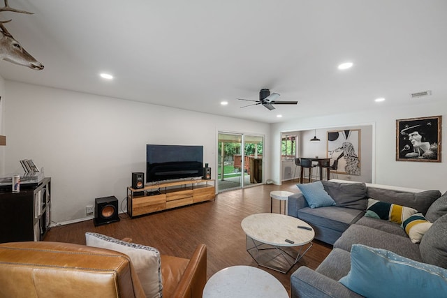 10207 Ray Ave, Austin, TX 78758 - living room with wood finished floors, ceiling fan, and recessed lighting
