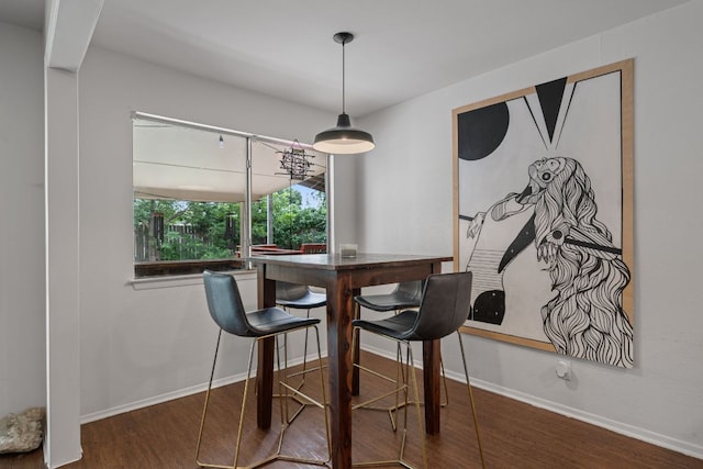 10207 Ray Ave, Austin, TX 78758 - dining area with wood finished floors and baseboards