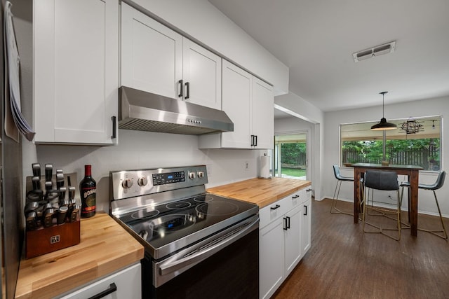 10207 Ray Ave, Austin, TX 78758 - kitchen featuring stainless steel range with electric cooktop, butcher block counters, under cabinet range hood, dark wood-style floors, and white cabinets