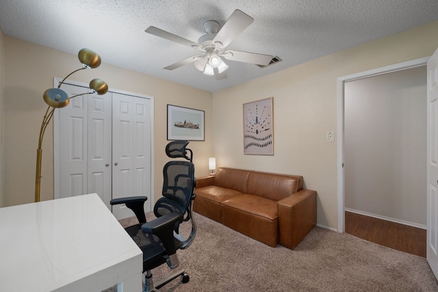 10207 Ray Ave, Austin, TX 78758 - carpeted office with ceiling fan, a textured ceiling, and baseboards