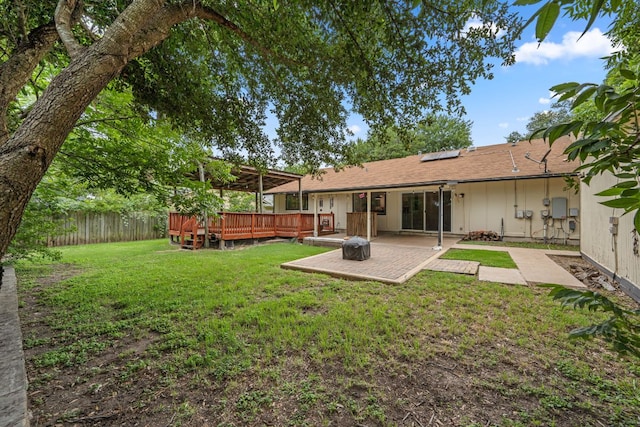 10207 Ray Ave, Austin, TX 78758 - view of yard featuring a patio and a wooden deck