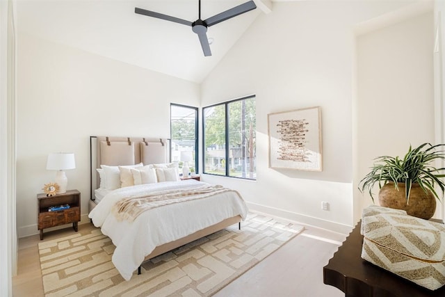 2301 Canterbury, Austin, TX 78702 - bedroom with light wood finished floors, baseboards, high vaulted ceiling, beamed ceiling, and a ceiling fan