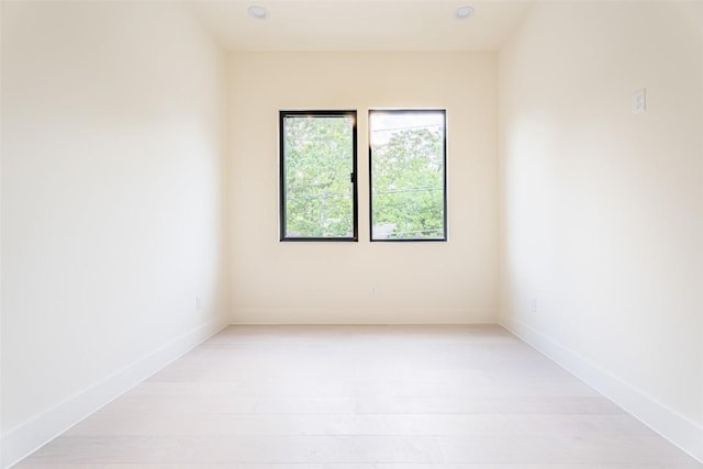 2301 Canterbury, Austin, TX 78702 - unfurnished room featuring light wood-style flooring and baseboards