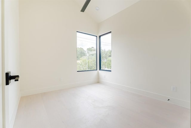 2301 Canterbury, Austin, TX 78702 - unfurnished room featuring vaulted ceiling, ceiling fan, and baseboards