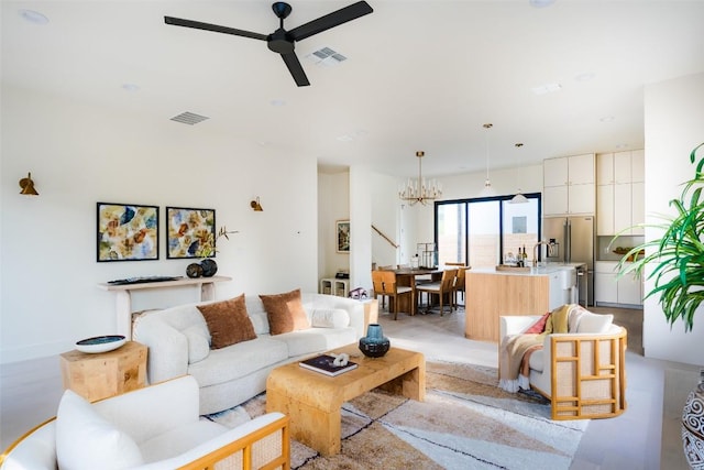 2301 Canterbury, Austin, TX 78702 - living room with a chandelier and a ceiling fan