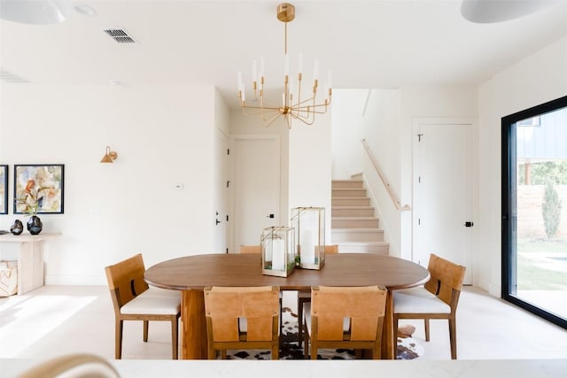 2301 Canterbury, Austin, TX 78702 - dining space with a chandelier and stairs