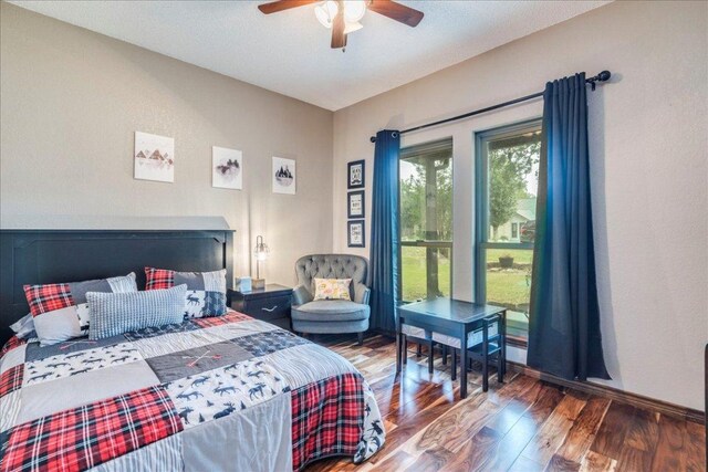 336 Primrose Dr, Kyle, TX 78640 - bedroom with wood finished floors and ceiling fan