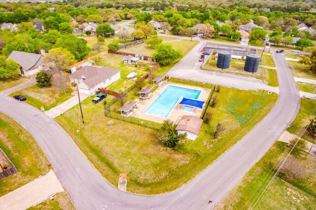336 Primrose Dr, Kyle, TX 78640 - aerial perspective of suburban area featuring a pool